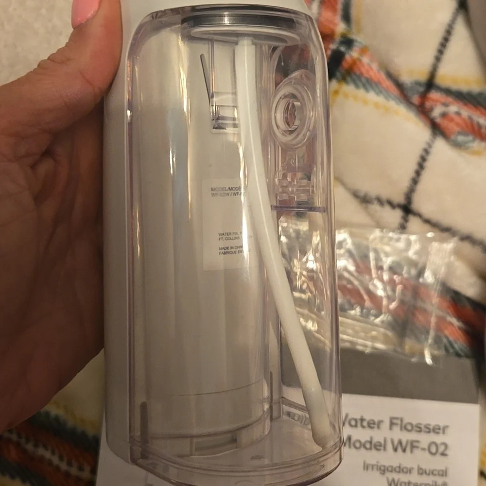 New Waterpik Water Flosser & 2 Crest Toothpaste Bundle - Picture 2 of 3